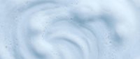 White creamy foam texture with swirls and bubbles for skincare cosmetics soap shampoo backgrounds and product design applications.