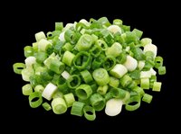 Chopped green onions and white scallion pieces isolated on transparent background, ready for culinary design, recipe graphics, food packaging, cooking blogs, restaurant menus, and print-on-demand products.