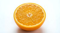 Fresh orange half cut showing juicy pulp and vibrant color, isolated on white background, ready for food and nutrition design use.