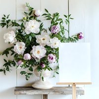 Fresh peony and rose bouquet in ceramic vase on rustic wooden table against white shiplap wall for home decor and interior design projects.