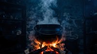 Cast iron pot cooking over open campfire flames with dramatic smoke rising in dark atmospheric outdoor setting for camping adventures.