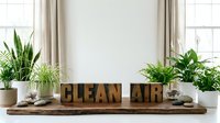Clean air wooden letter blocks display on windowsill with green houseplants and natural light for healthy indoor living and air purification concept.