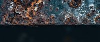 Weathered rusty metal surface with peeling paint and corrosion damage showing industrial decay and aging effects on steel material background.