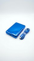 Blue external hard drive with USB cable isolated on white background, ready for data storage and backup solutions.