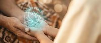 Hands holding glowing holographic heart symbol representing healthcare technology, medical innovation, and digital wellness solutions for modern treatment.