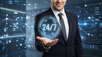 Professional businessman in dark suit presenting glowing 24/7 customer service hologram with digital network connections in modern tech environment.