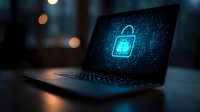 Glowing digital padlock icon on laptop screen with binary code background, representing cybersecurity and data protection in dark office setting.