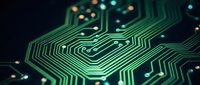 Circuit board with glowing green pathways and illuminated connection points, representing technology, data processing, and digital innovation for tech backgrounds.