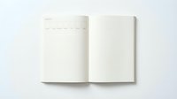 Open notebook with blank pages and subtle grid lines on left page, right page empty, isolated on white background for design mockups and branding presentations.