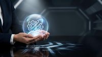 Businessman holding glowing digital sphere with gear and wrench icons representing technical support and maintenance services in futuristic environment.