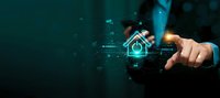 Businessman touching digital house icon with futuristic holographic interface and glowing data elements on dark teal background for smart home technology concepts.