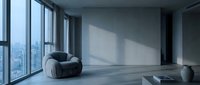 Modern minimalist loft interior with contemporary armchair, floor-to-ceiling windows overlooking cityscape, polished concrete floors, and natural light for residential or commercial design projects.