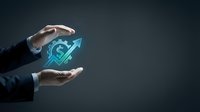 Businessman hands protecting glowing dollar sign with upward arrow symbolizing financial growth and investment security on dark background.