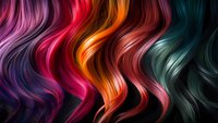 Vibrant wavy hair strands in multiple bright colors including pink, red, orange, and teal creating dynamic flowing pattern against dark background.
