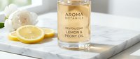 Revitalizing lemon and peony oil in clear glass bottle on marble surface with fresh lemon slices and white flowers, ideal for beauty and wellness product marketing.
