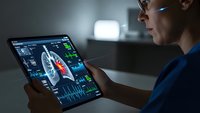 Female healthcare professional analyzing cardiac medical imaging on digital tablet in modern clinical environment for diagnostic purposes.