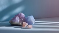 Healing crystals and mineral specimens in soft pastel colors on minimalist background with dramatic window shadows creating serene atmosphere.