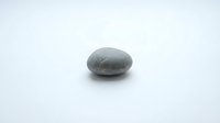 Smooth gray stone pebble isolated on white background, suitable for wellness, spa, meditation, and design projects.