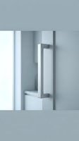 Modern chrome door handle on white glass panel with minimalist design for contemporary interior architecture and home renovation projects.