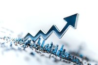 Upward trending arrow over financial chart with city skyline silhouette in blue tones, showing business growth and market success. Selective focus effect.
