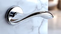 Modern chrome door handle with elegant curved design on white marble background, showcasing contemporary interior hardware for luxury homes.