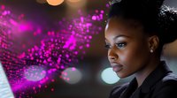 Young African American businesswoman with elegant updo hairstyle looking thoughtfully into distance against blurred magenta light bokeh background.