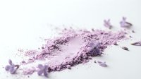 Crushed purple eyeshadow powder scattered on white surface with loose pigment particles, suitable for cosmetics, beauty, and makeup design projects.