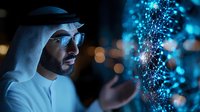 Middle Eastern businessman in traditional white kandura examining glowing digital DNA helix hologram, futuristic technology concept with blue lighting and bokeh effects.