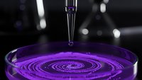 Laboratory pipette dispensing purple liquid creating spiral pattern in petri dish for scientific research and biotechnology experiments.