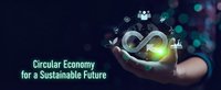 Businessman holding glowing infinity symbol with recycling icons representing circular economy and sustainable business practices for environmental future.