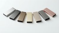 Isolated metal and wood flooring samples arranged in a fan pattern, showcasing various finishes and colors for interior design, renovation, and home decor selection.