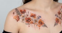 Young woman with delicate orange poppy flower tattoo on shoulder and chest area showcasing botanical ink art and feminine body modification style.