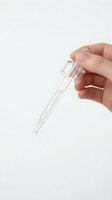 Hand holding glass dropper pipette for skincare serum or essential oil application on clean white background for cosmetic and beauty product design.