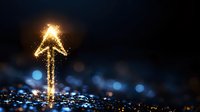 Glowing golden arrow pointing upward created from sparkling light particles against dark background with bokeh effect, symbolizing growth and success.