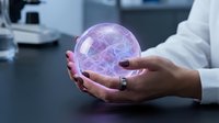Female scientist with dark skin tone holding glowing purple neural network sphere in laboratory setting, representing artificial intelligence, brain technology, and digital innovation research.