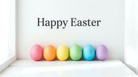 Colorful rainbow Easter eggs in a row on white background with Happy Easter text, festive spring holiday greeting card concept.