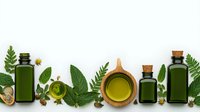 Green glass bottles with essential oils and fresh herbs on white background, wooden bowl with olive oil, natural spa and aromatherapy border composition.