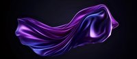 Luxurious flowing purple and blue silk fabric floating in darkness creates dramatic movement and elegant curves against black background. Suitable for luxury design projects.