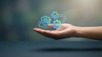 Caucasian hand holding glowing digital icons representing sustainable energy, renewable power, and environmental protection for green technology concepts.