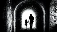 Adult male and child walking through dark arched tunnel toward bright light, silhouetted figures in monochrome. Hope and guidance concept.