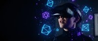 Young Asian man wearing VR headset surrounded by glowing geometric shapes and digital particles in futuristic virtual reality technology concept.