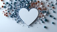White paper heart shape surrounded by scattered blue and copper metallic beads on light background, romantic festive composition for valentines day cards and designs.
