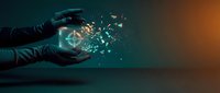 Hands holding glowing digital cube with dispersing particles, representing data technology, innovation, and digital transformation for business and tech concepts.
