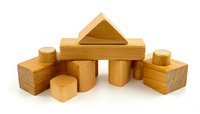 Wooden building blocks for children's educational play, featuring geometric shapes including cylinders, triangles, and cubes on white background.