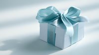Elegant white gift box with light blue satin ribbon bow on soft neutral background, perfect for celebrations, holidays, and special occasions.