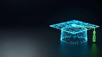 Digital graduation cap made of glowing blue particles with green tassel on dark background representing online education and academic achievement.