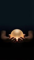 Hands holding glowing orb against dark background, symbolizing future vision, fortune telling, spiritual energy, and mystical guidance for divination concepts.