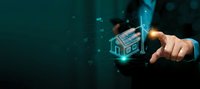 Businessman touching holographic house icon with digital network connections on dark teal background for real estate technology and smart home concepts.