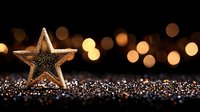 Golden star decoration on glittering surface against dark background with blurred bokeh lights creating festive holiday atmosphere for Christmas and New Year celebrations.