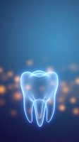 Glowing blue tooth with roots on blurred bokeh background for dental care, oral health and dentistry concepts.